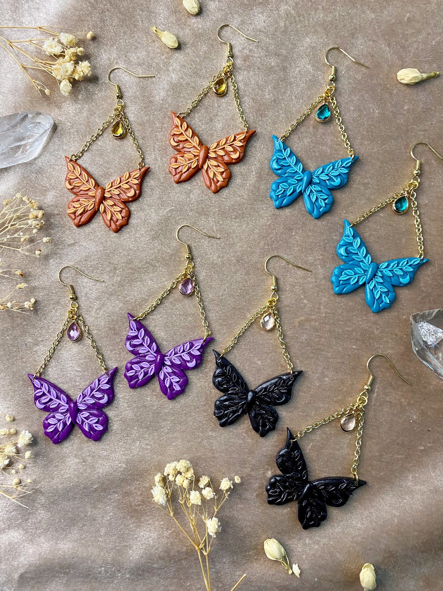 polymer clay monochrome butterfly and leafy dangle earrings