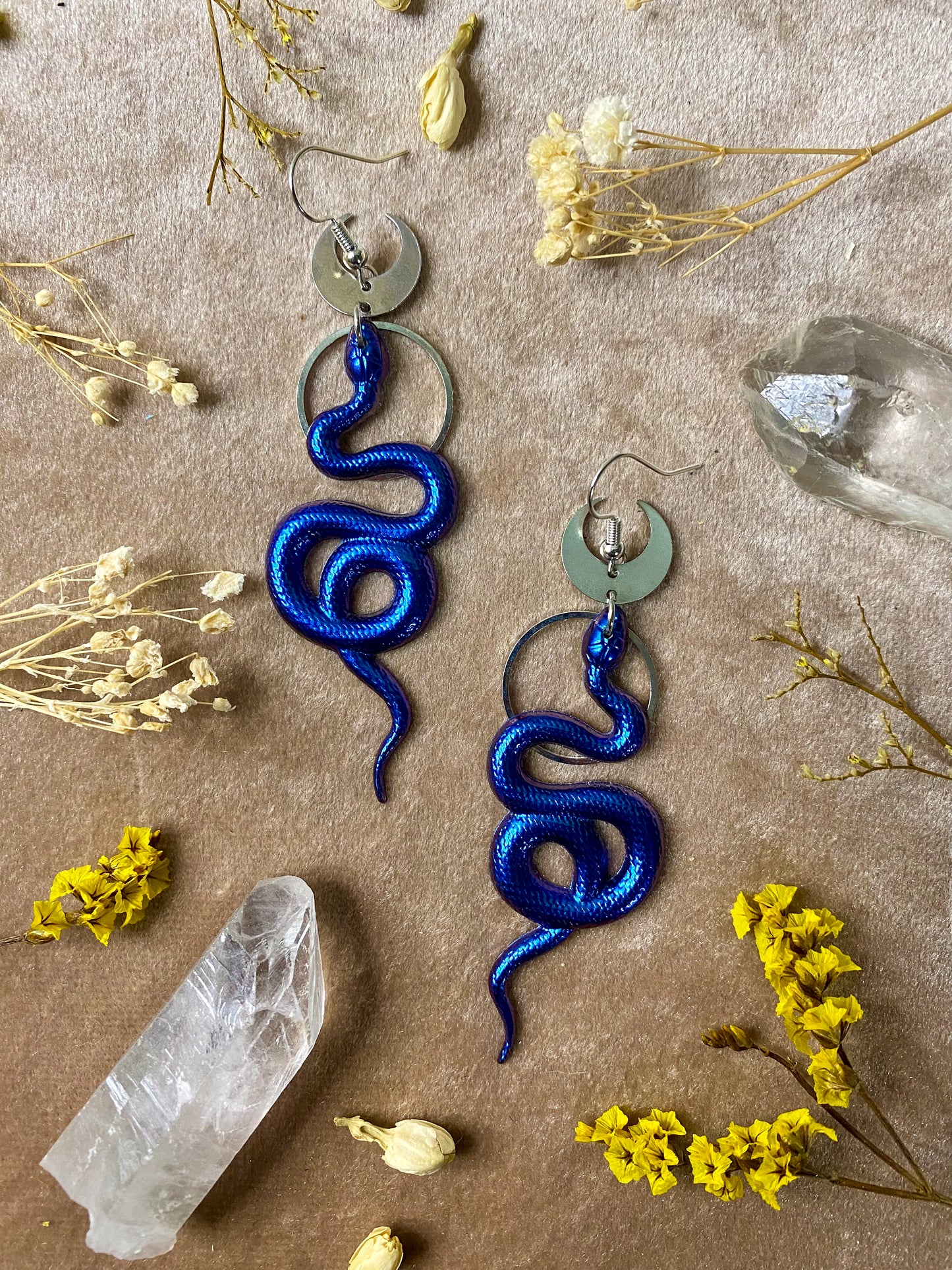 resin blue and silver coil snake dangle earrings