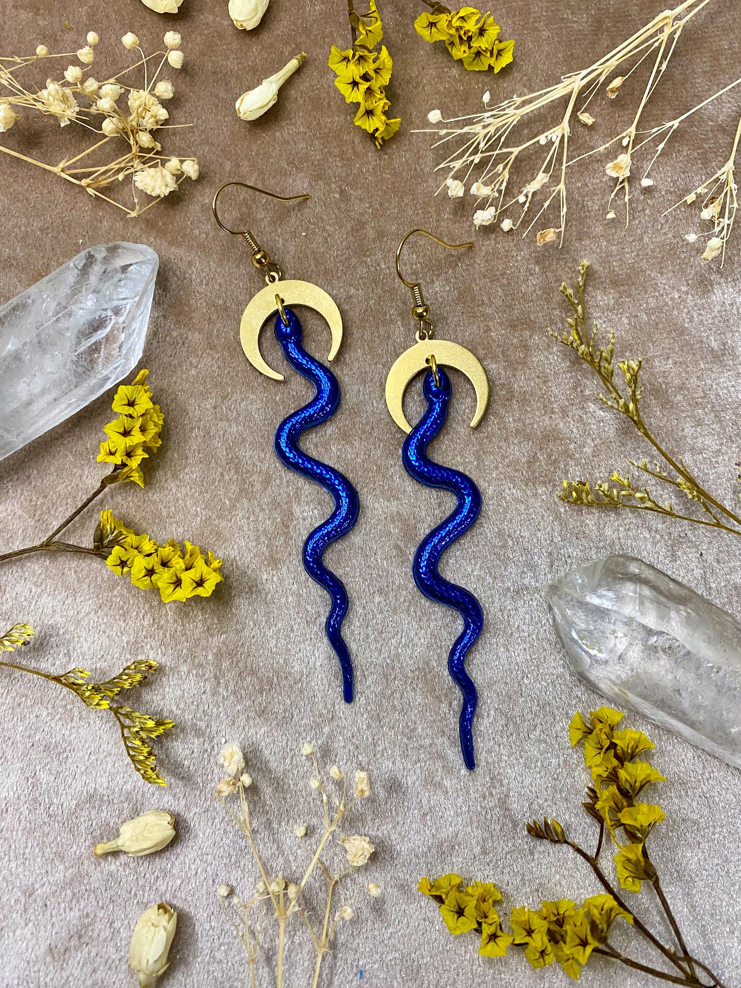 blue resin snake dangle earrings