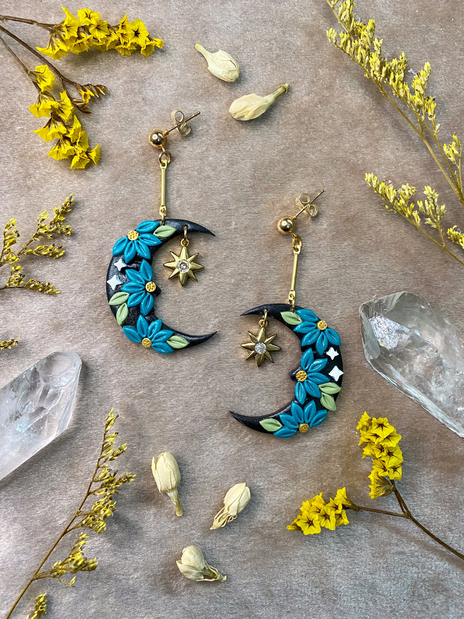 polymer clay teal floral moon dangle earrings