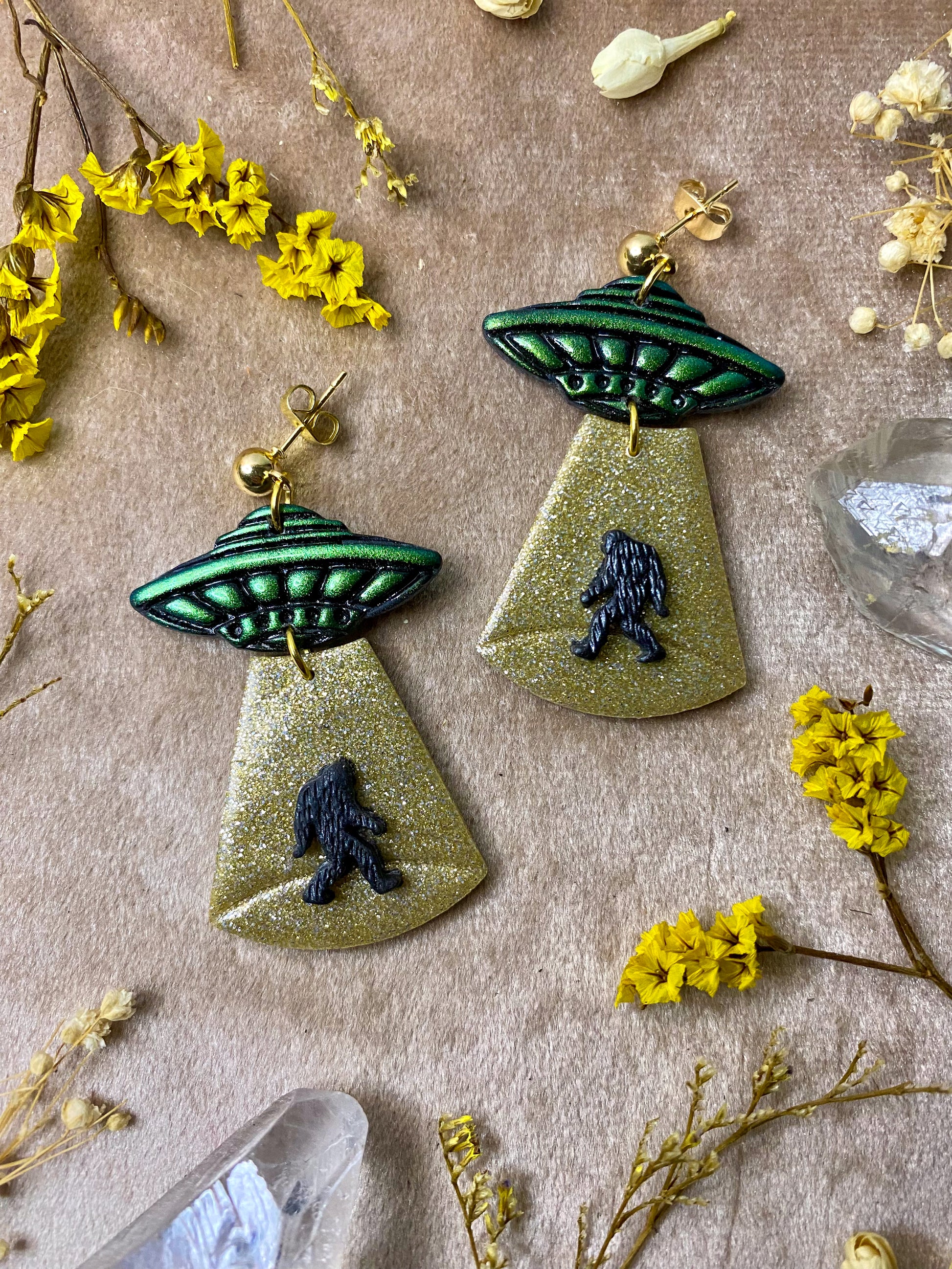 polymer clay bigfoot alien abduction gold glitter dangle earrings