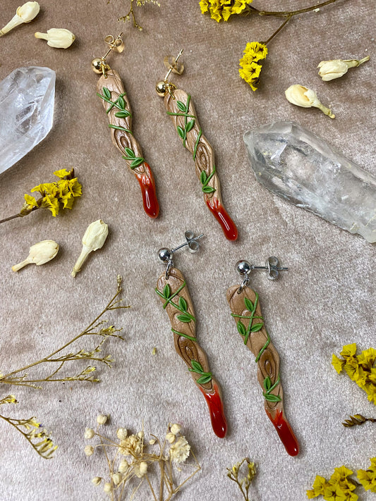 polymer clay and resin vampire bloody stake weapon earrings