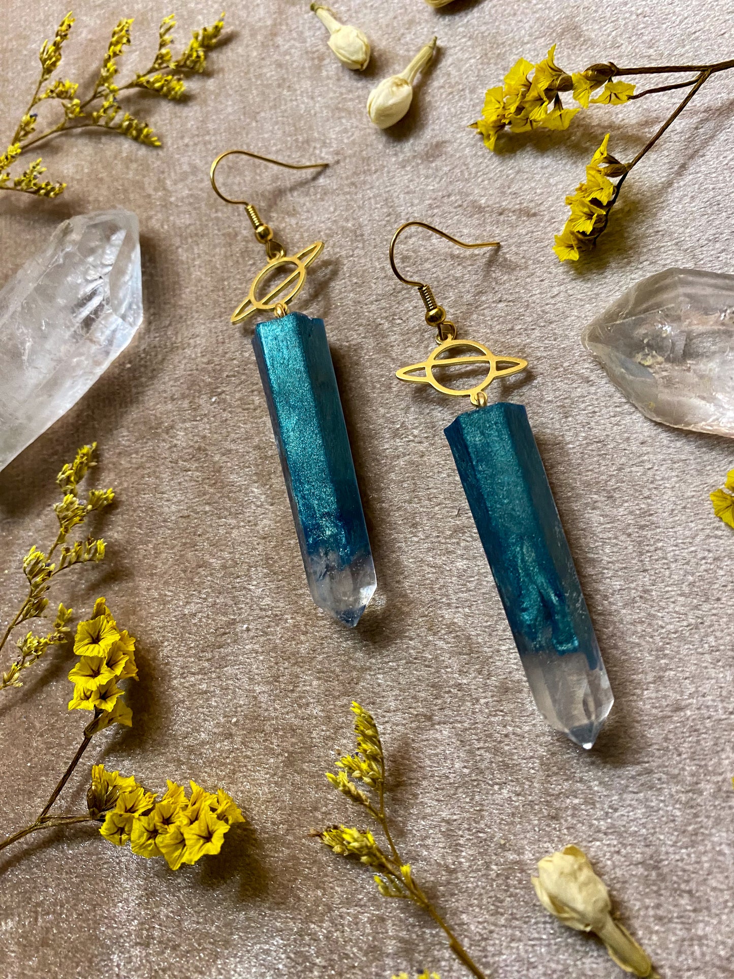 resin teal crystal dangle earrings
