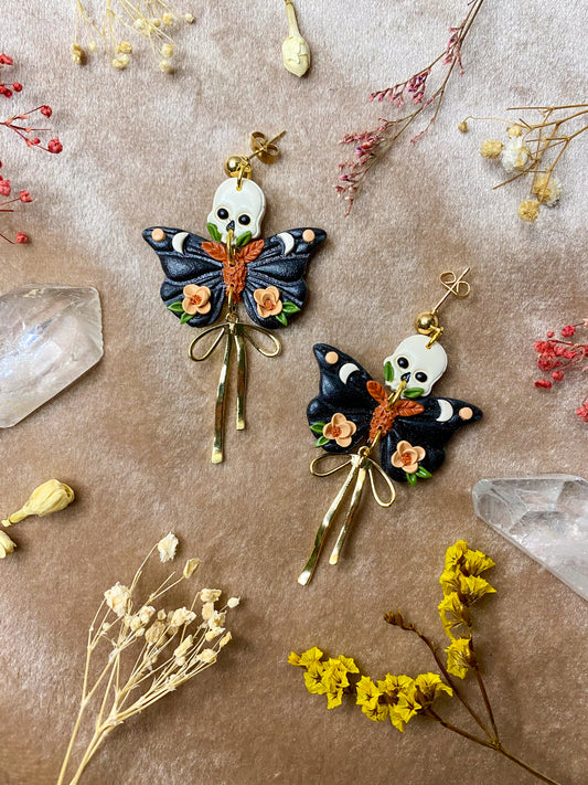 polymer clay flora skull death moth dangle earrings