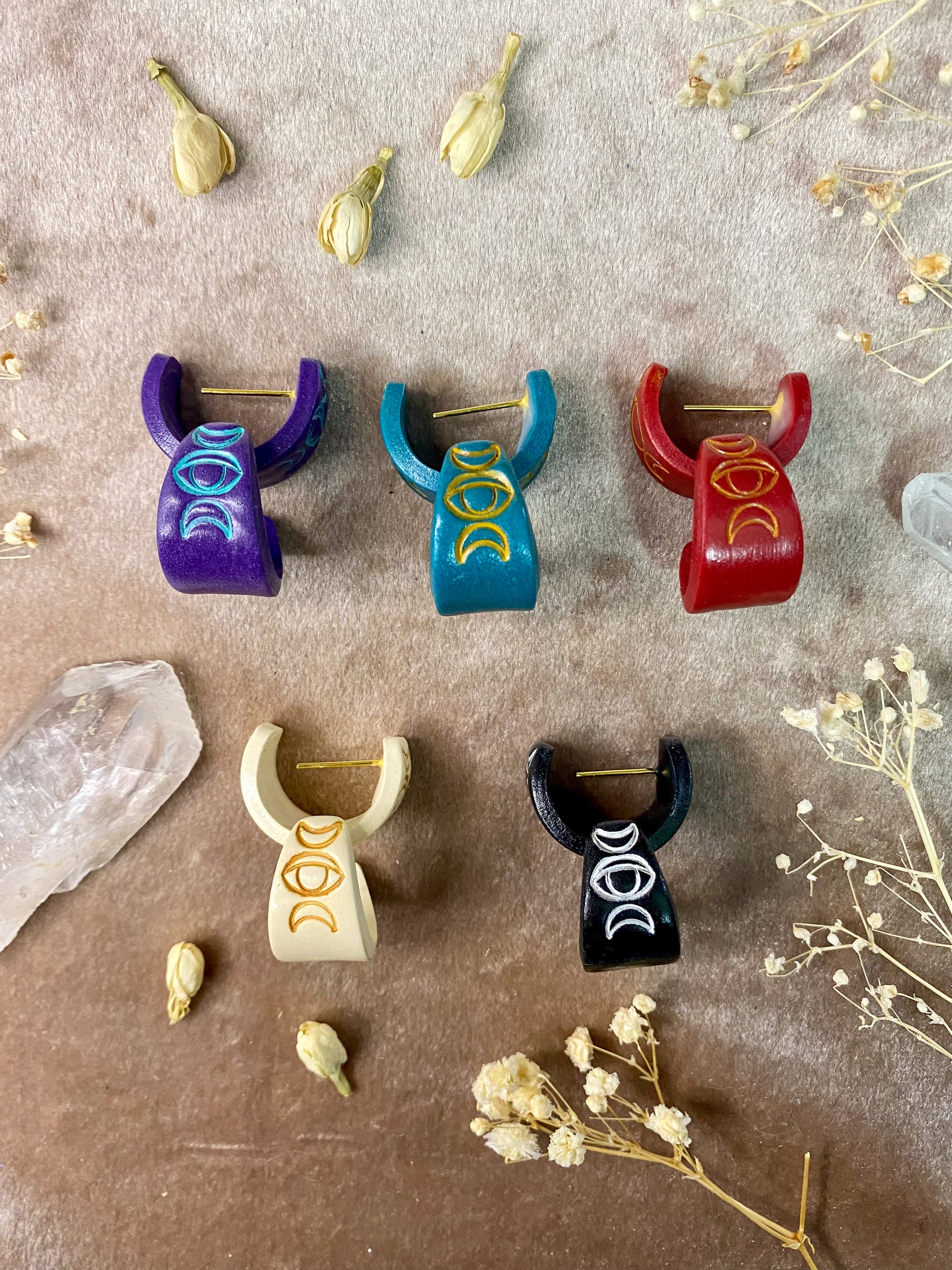 polymer clay evil eye and moon huggie hoop earrings