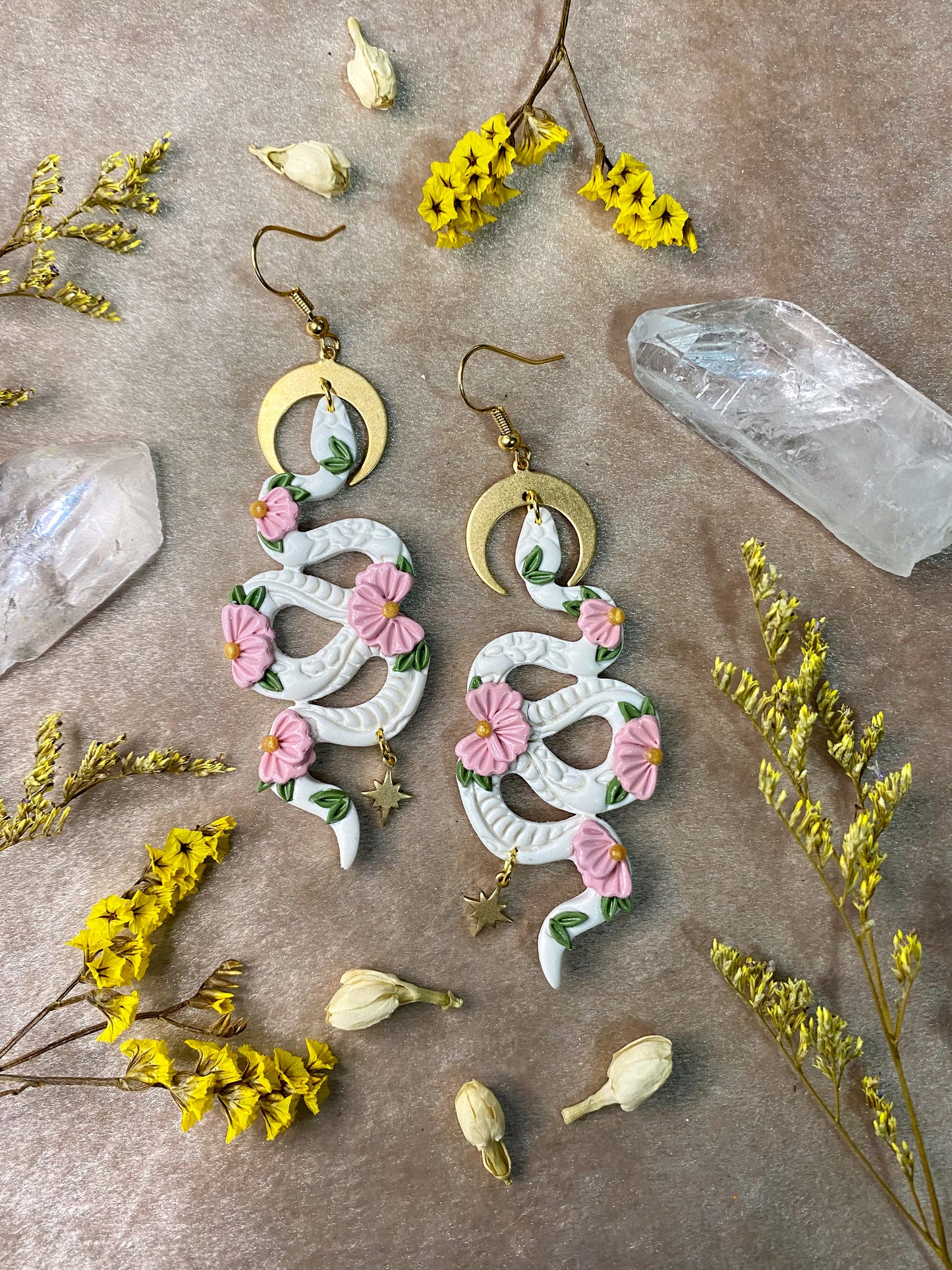 polymer clay white and pink floral snake dangle earrings