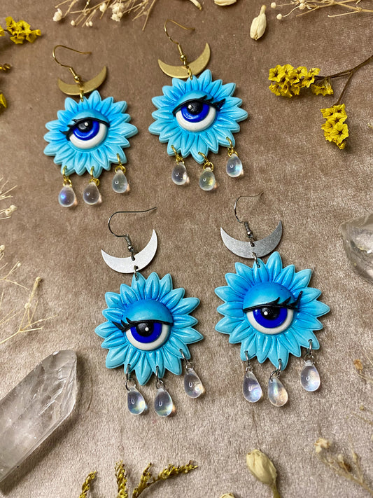 polymer clay blue flower eye dangle earrings