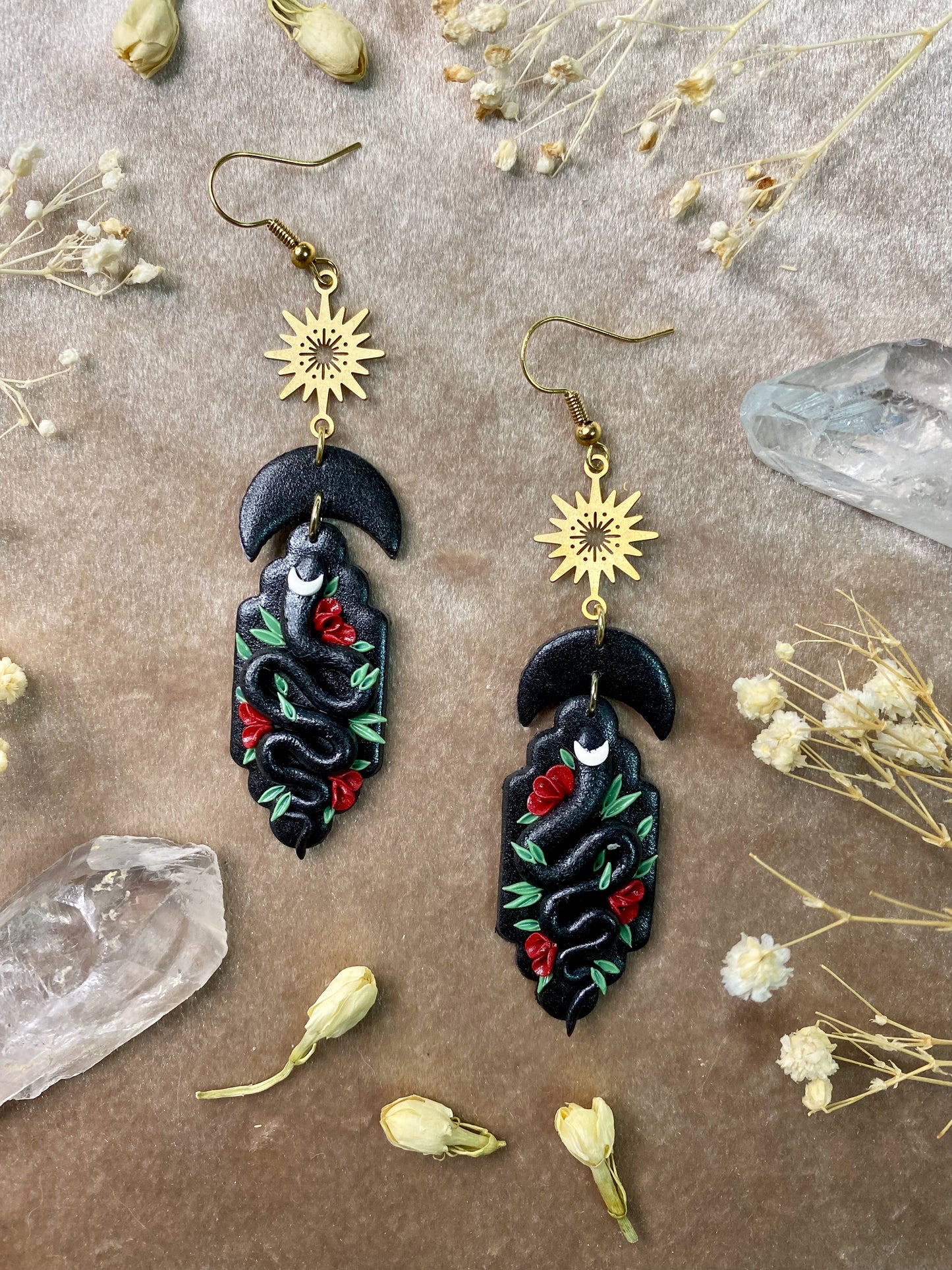 black floral snake earrings