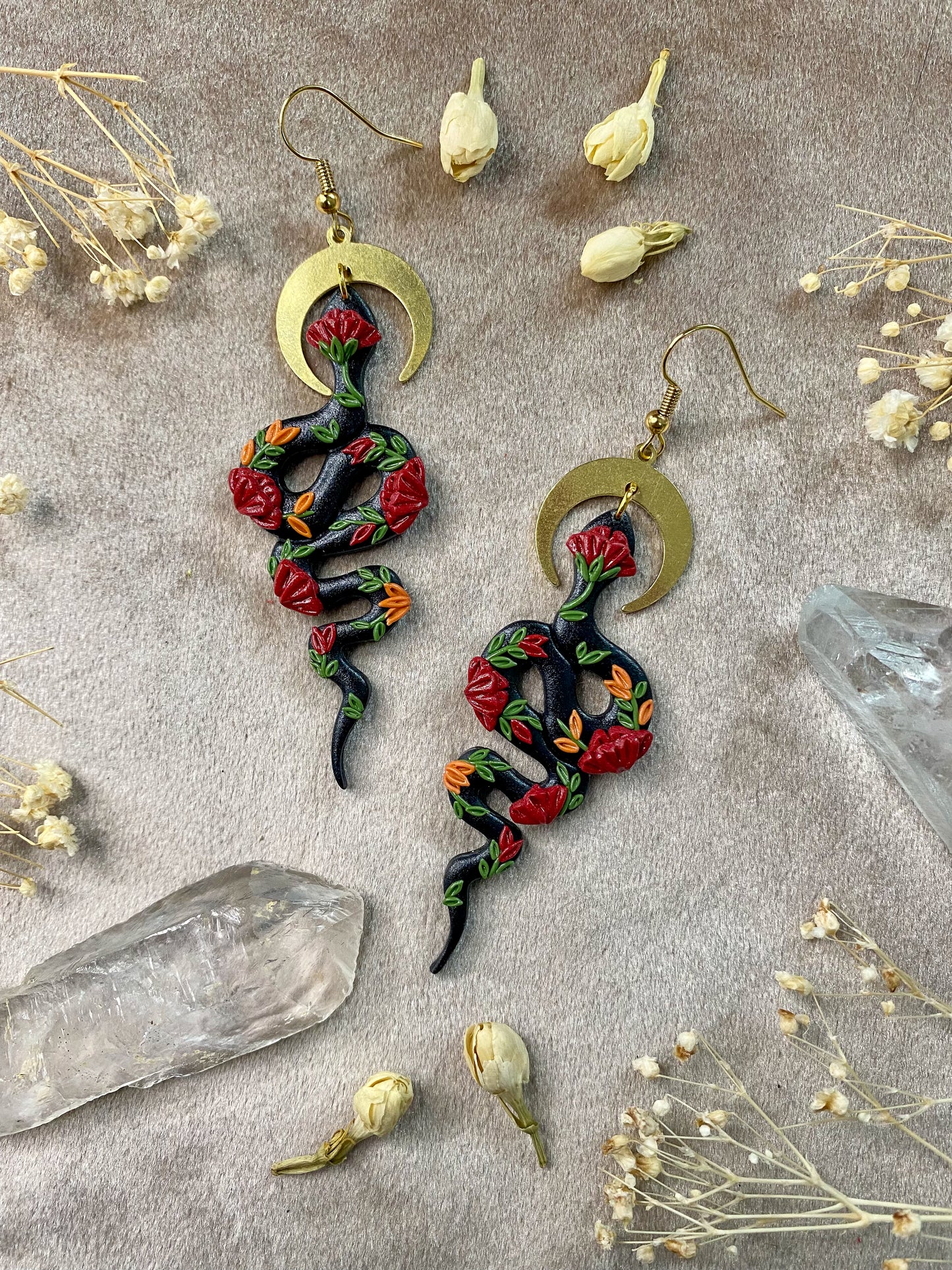 red, orange and black polymer clay snake dangle earrings