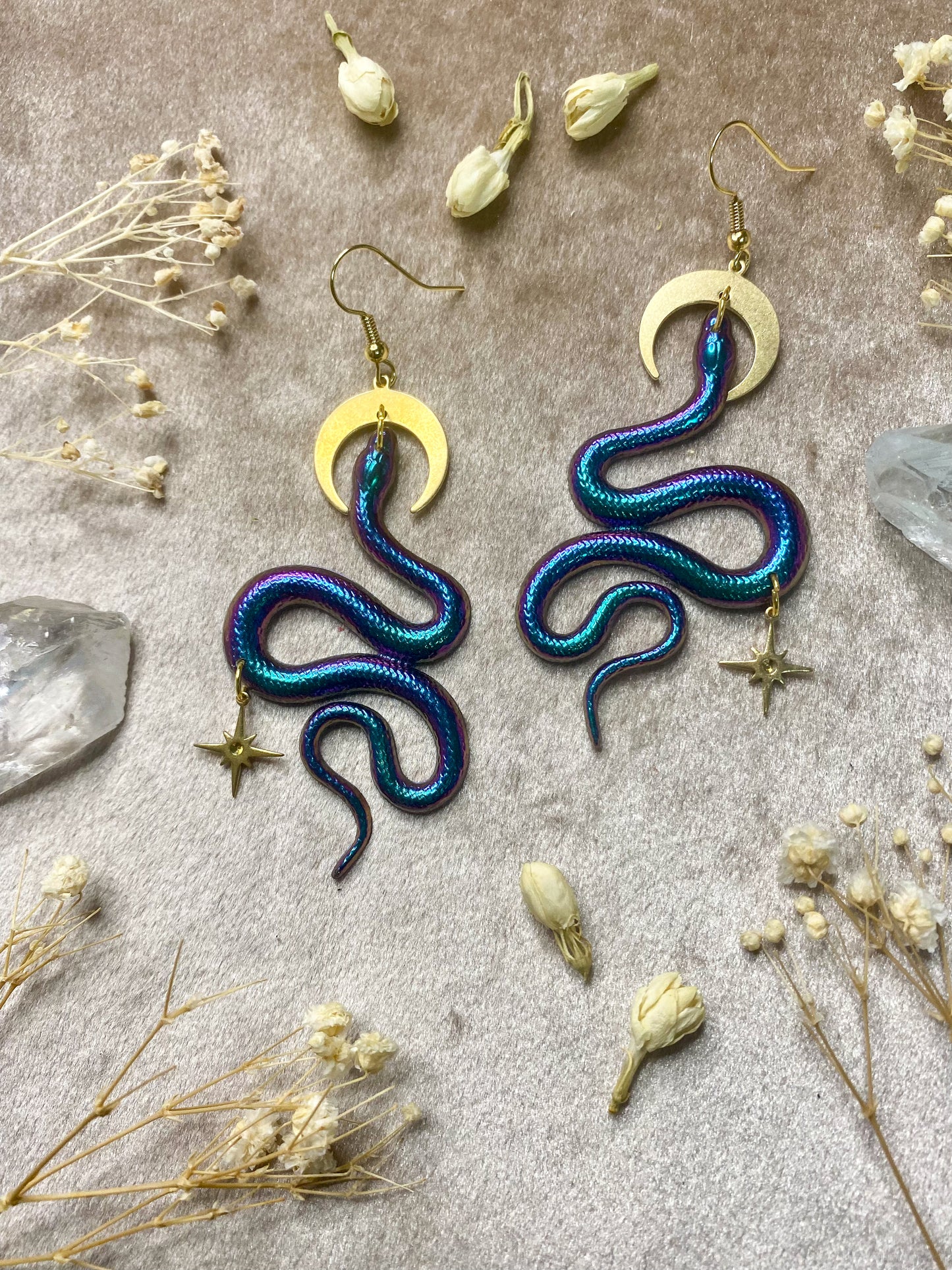color shifting teal and purple resin snake dangle earrings