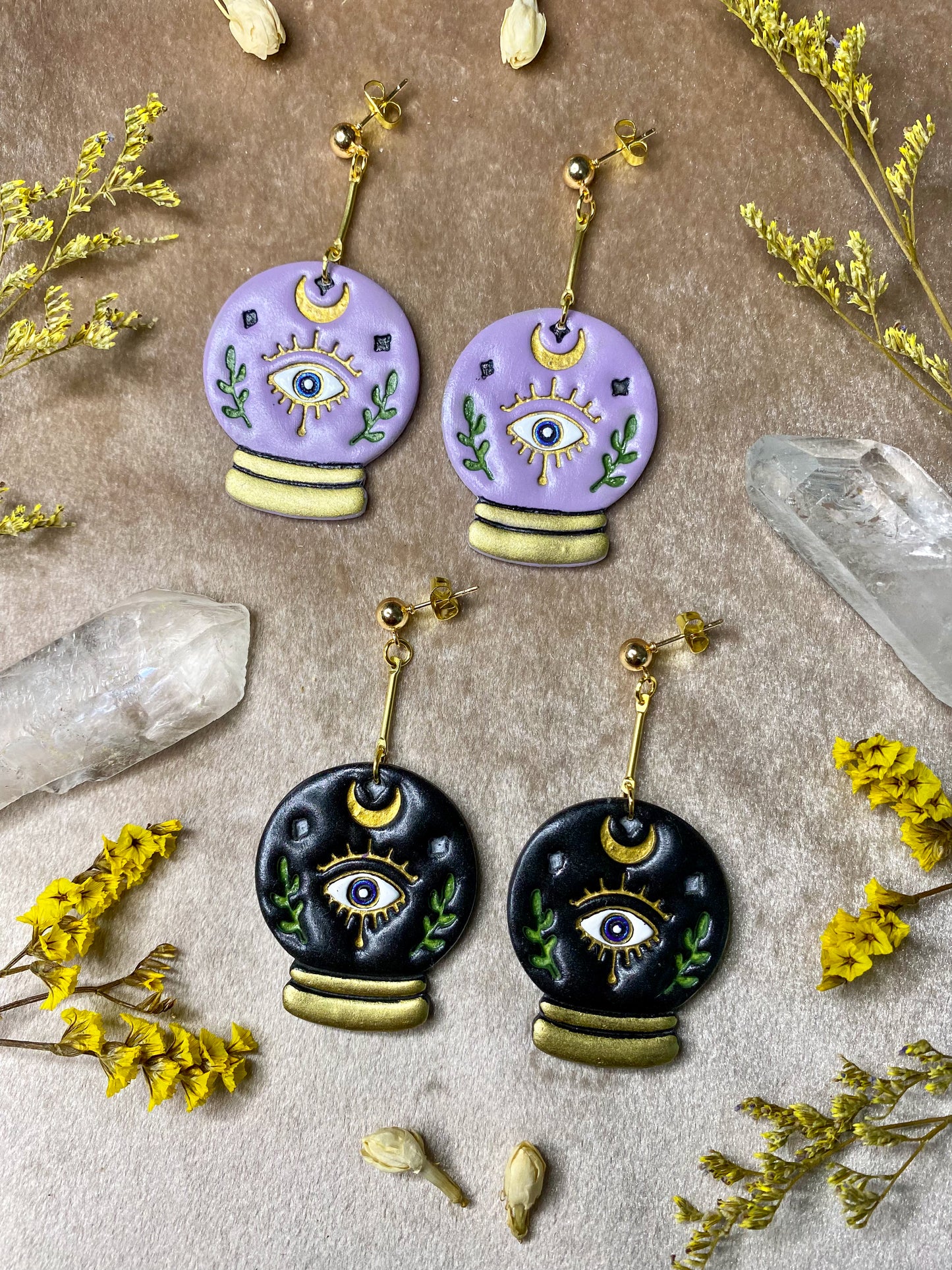 hand painted crystal ball and evil eye polymer clay dangle earrings